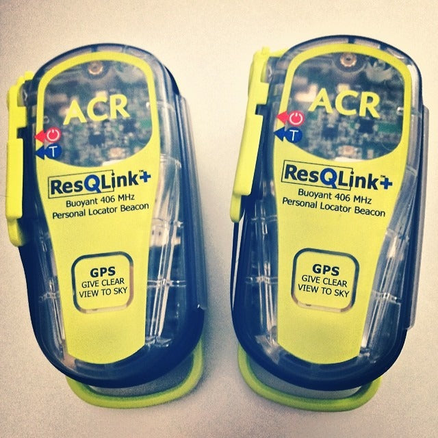 Two ACR ResQLink personal locator beacons with their aerials folded.
