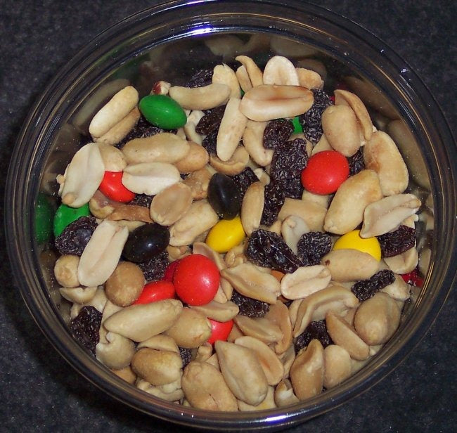 Trail mix containing nuts, raisins and chocolate pieces