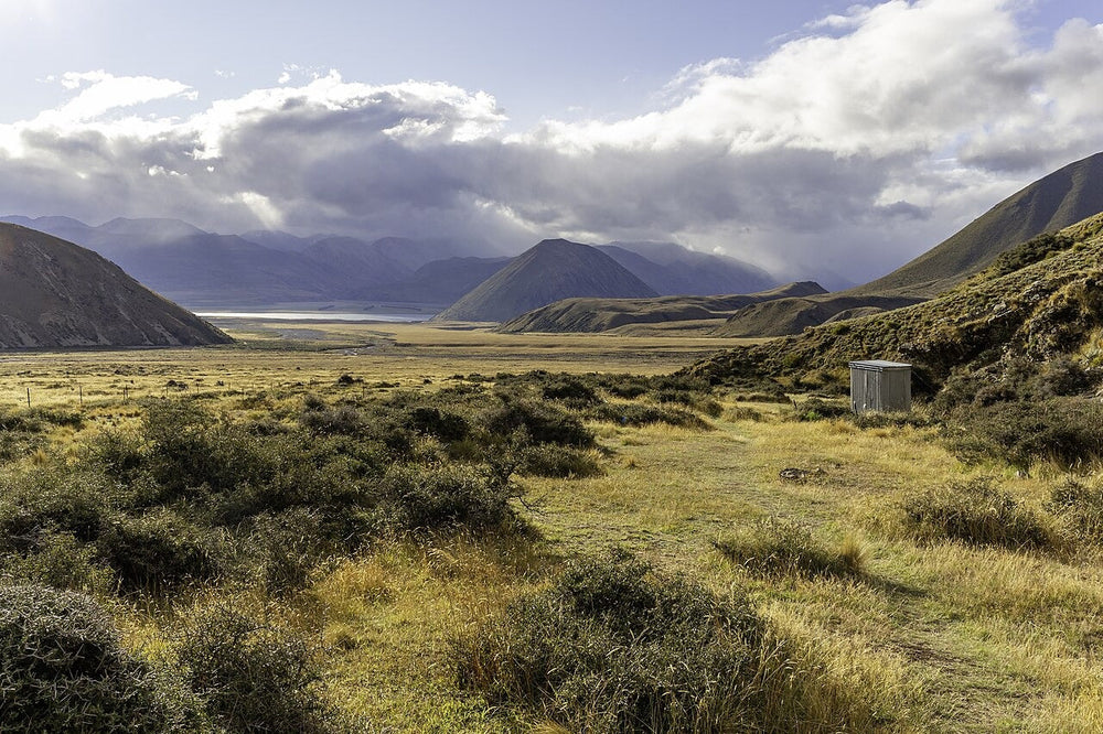 Small toilet building beside a backcountry campsite near Double Hut