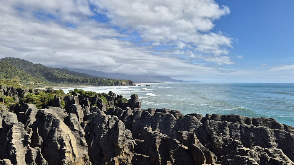 Layered limestone and the coast at Punakaiki Pancake Rocks.