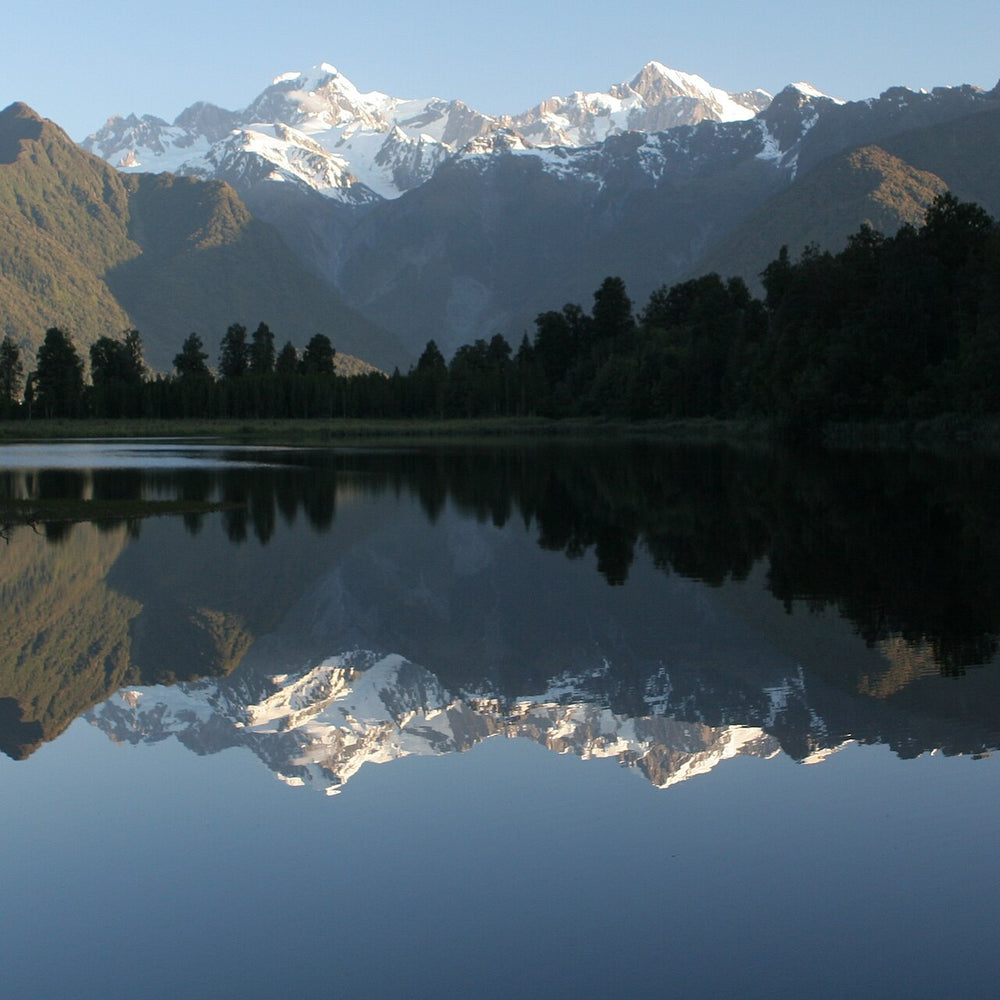Aoraki / Mount Cook and Mount Tasman reflected in Lake Matheson.