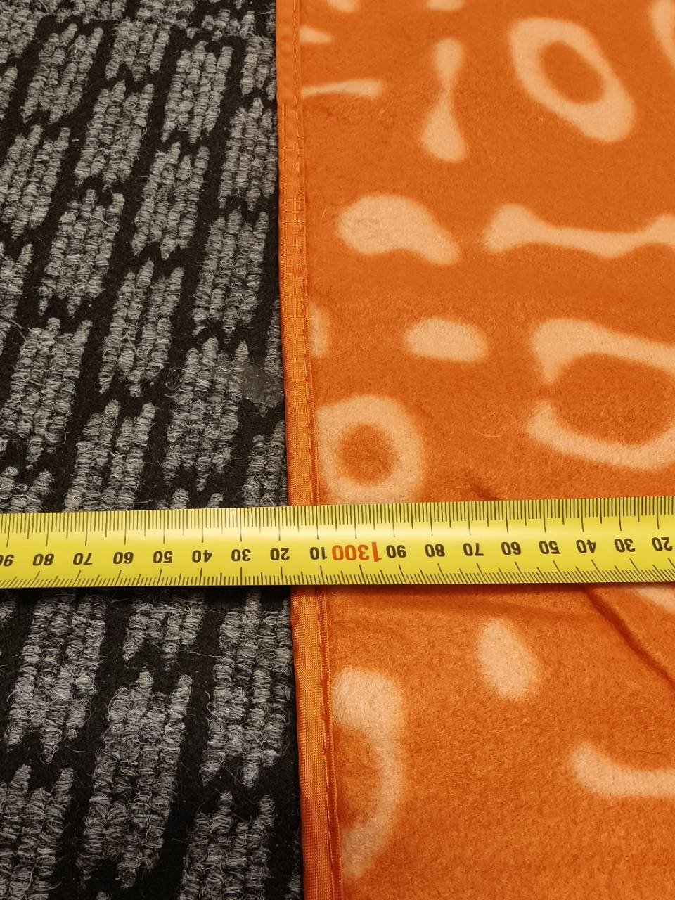Orange Kathmandu blanket measurement - approximately 132 cm