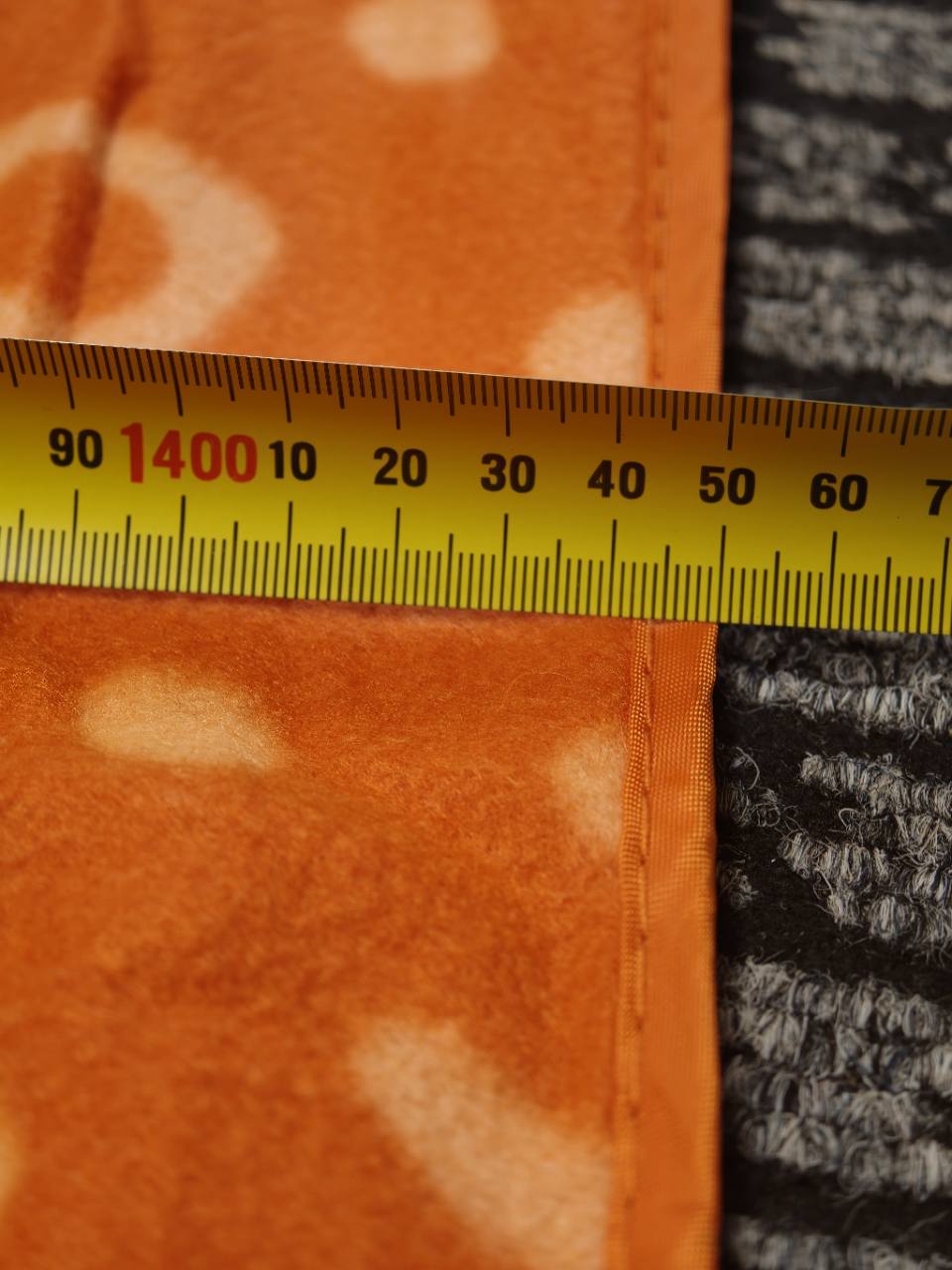 Orange Kathmandu blanket measurement - approximately 145 cm