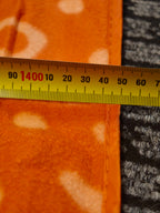 Orange Kathmandu blanket measurement - approximately 145 cm