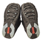 Burton Freestyle snowboard boot outsoles showing tread wear