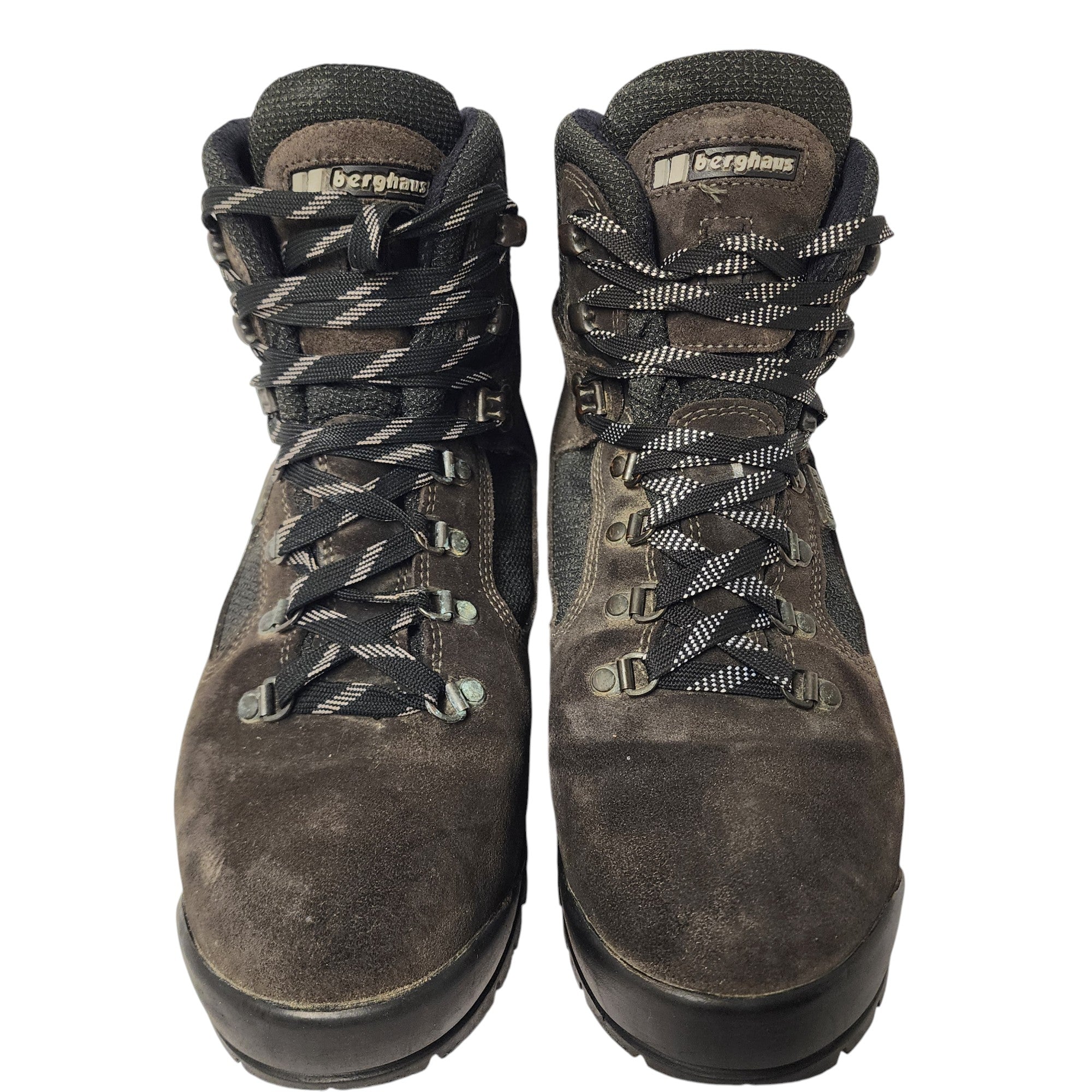 Pair of brown hiking boots with lace-up design on a white background