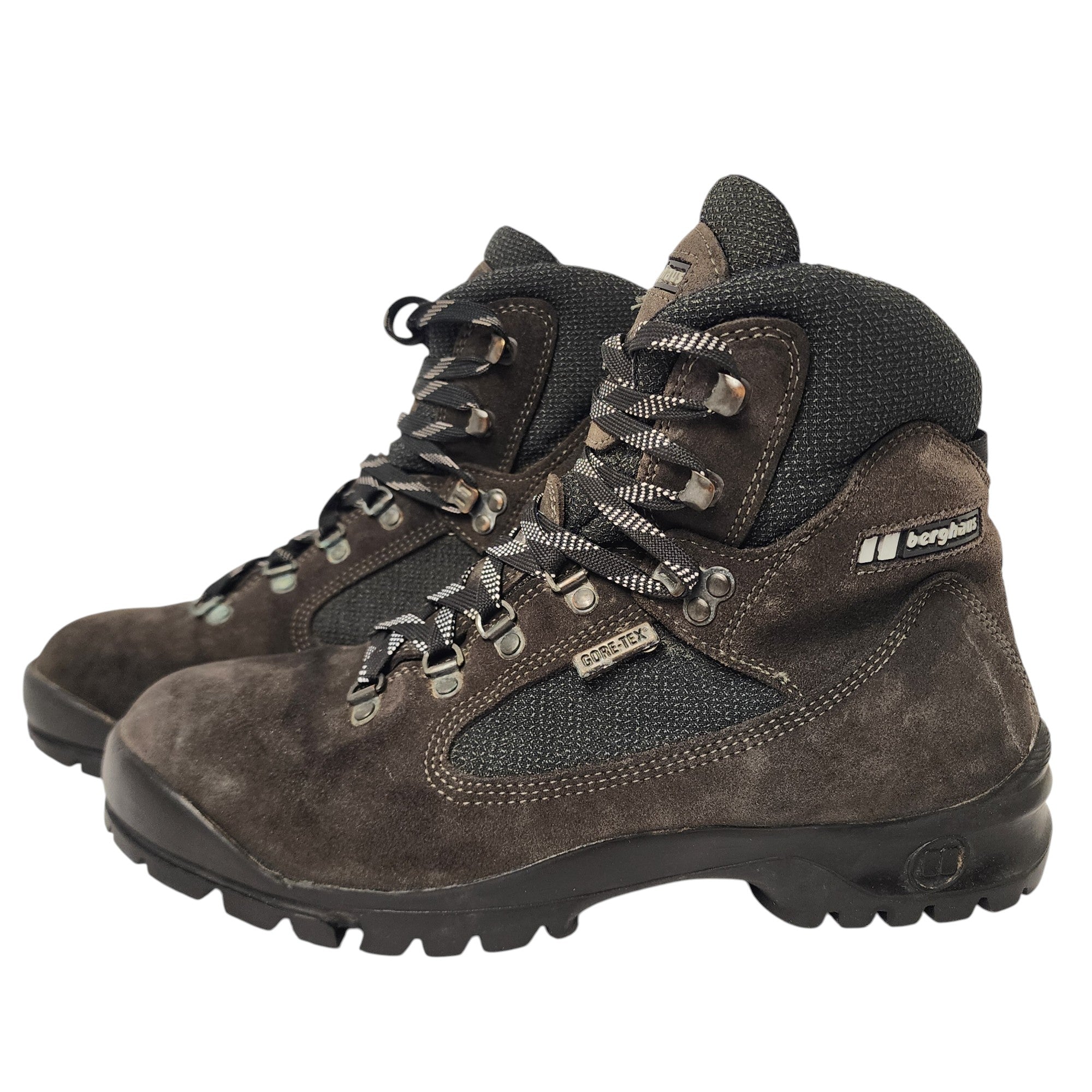 Pair of brown hiking boots with visible brand logo on a white background