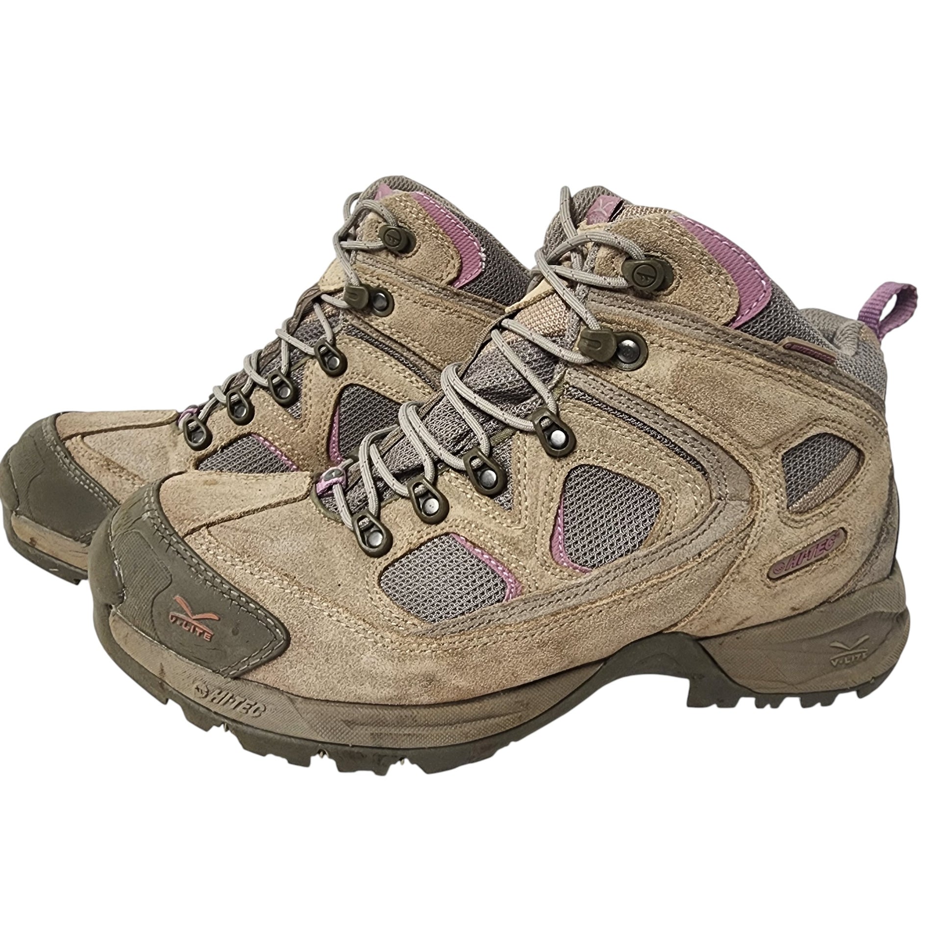 Pair of hiking boots with a beige and brown color scheme on a white background