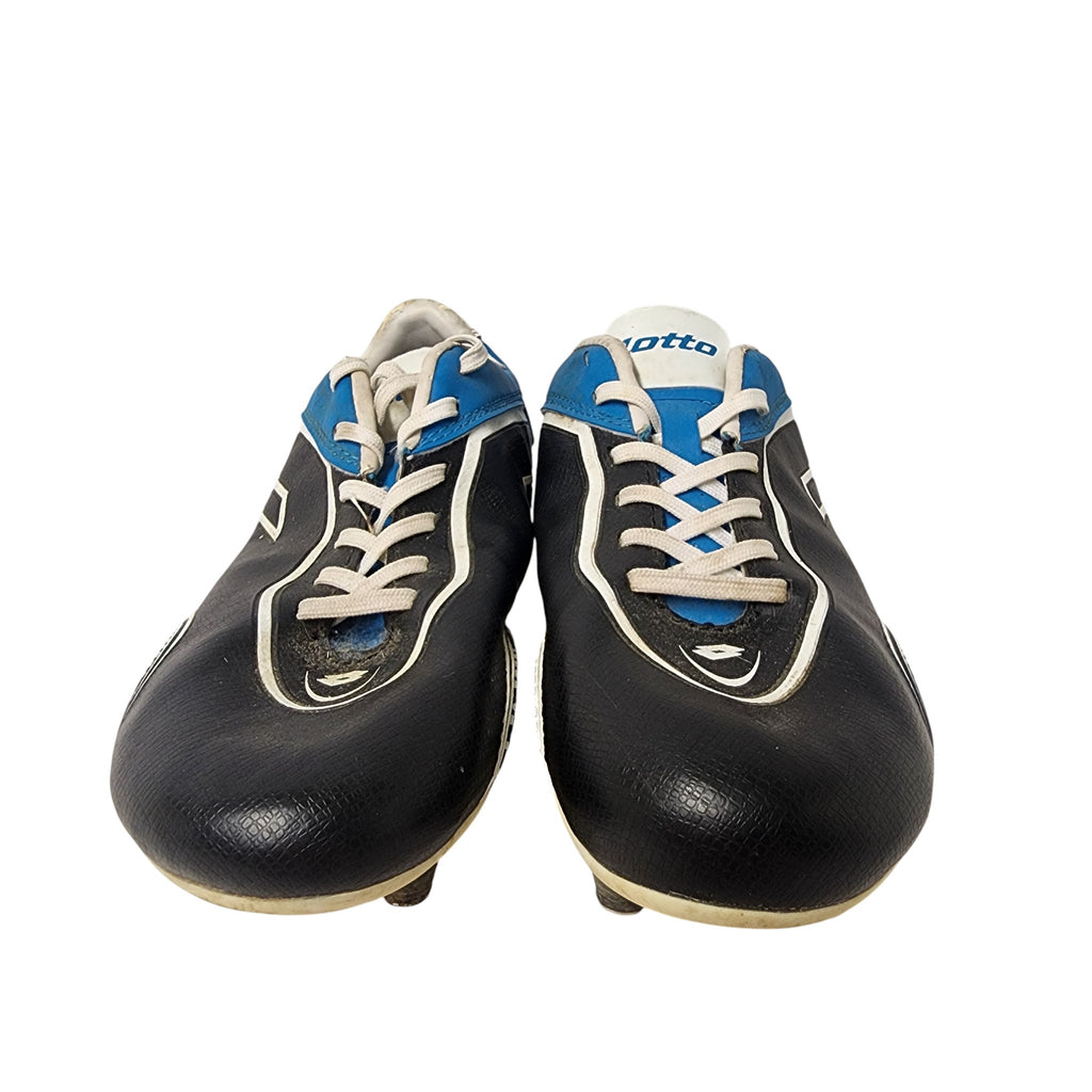 Pair of black and blue soccer cleats on a white background