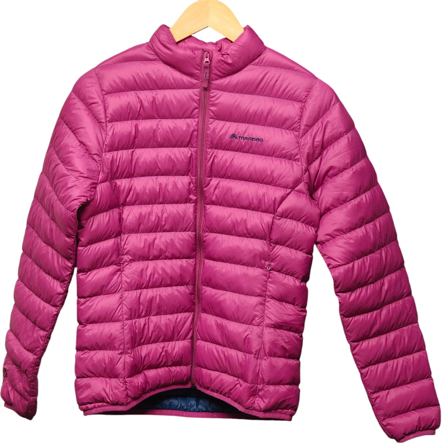 Pink puffer jacket on a hanger against a white background