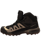 A black and beige Salomon X Ultra 2022 mid-top hiking boot shown from the side against a plain white background.