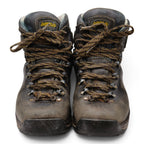 Pair of well-used Asolo leather tramping boots, front view