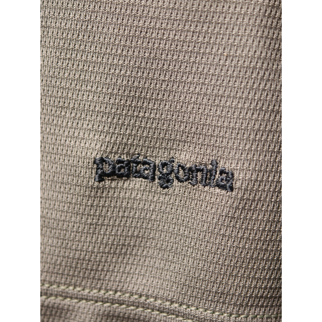 Embroidery close-up Patagonia logo on Patagonia Capilene top