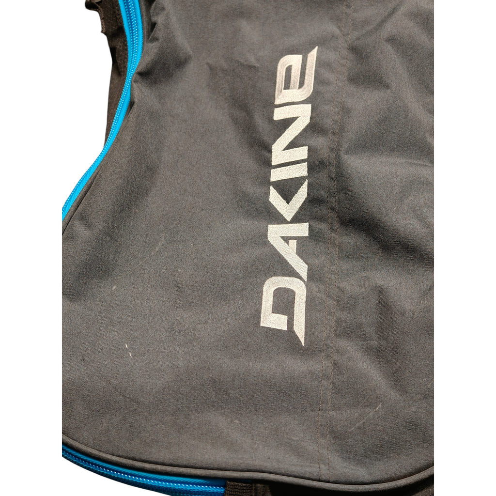 Close up of Dakine logo on bag fabric