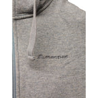Close-up of Macpac logo embroidered on chest of hoodie