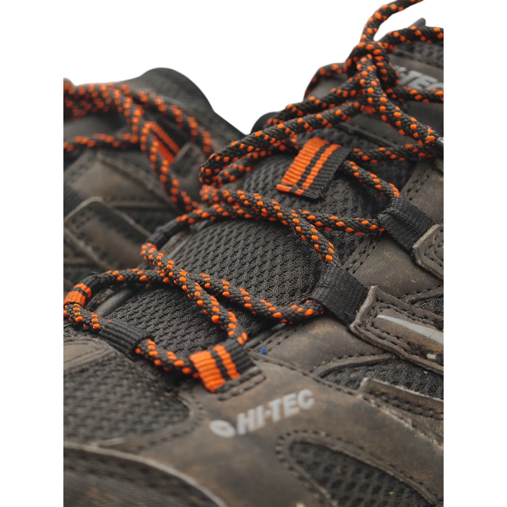 Close-up of Hi-Tec logo and laces on hiking shoe