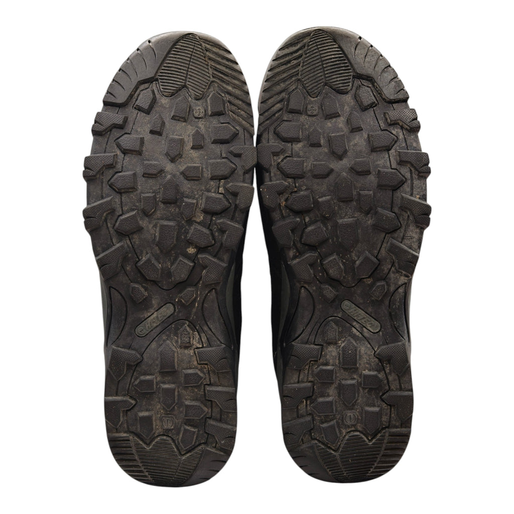 Soles of Hi-Tec Trailstone WP hiking boots showing tread and wear
