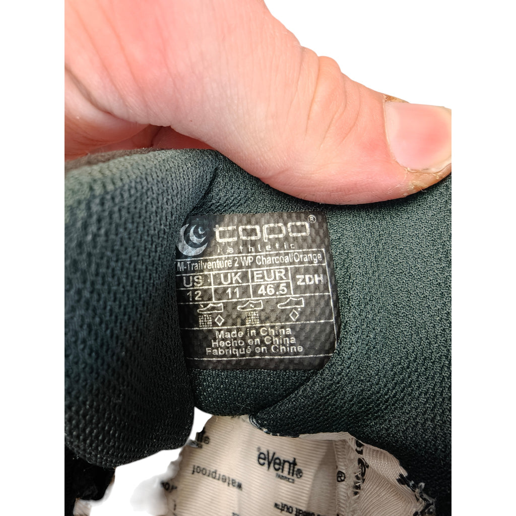 Topo Trailventure 2 WP label showing Charcoal/Orange and men's US 12, UK 11, EU 46.5 sizing