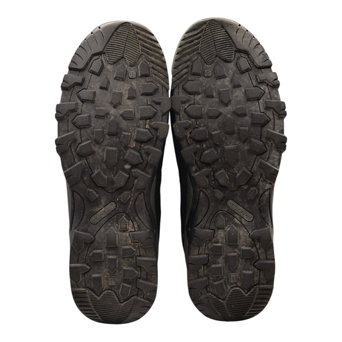 Soles of Hi-Tec Trailstone WP hiking boots showing tread and wear