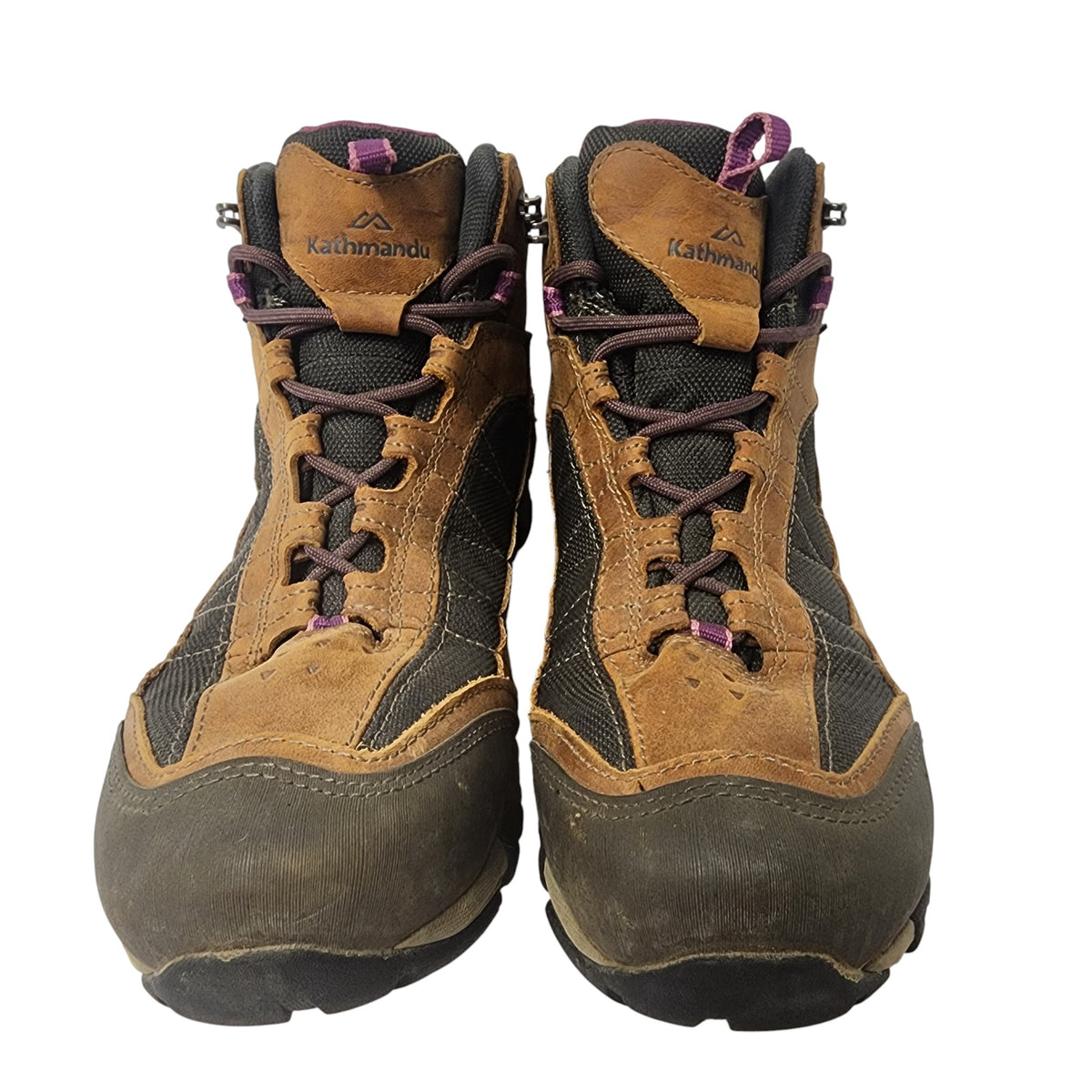 Pair of brown and black hiking boots with visible brand name on a white background