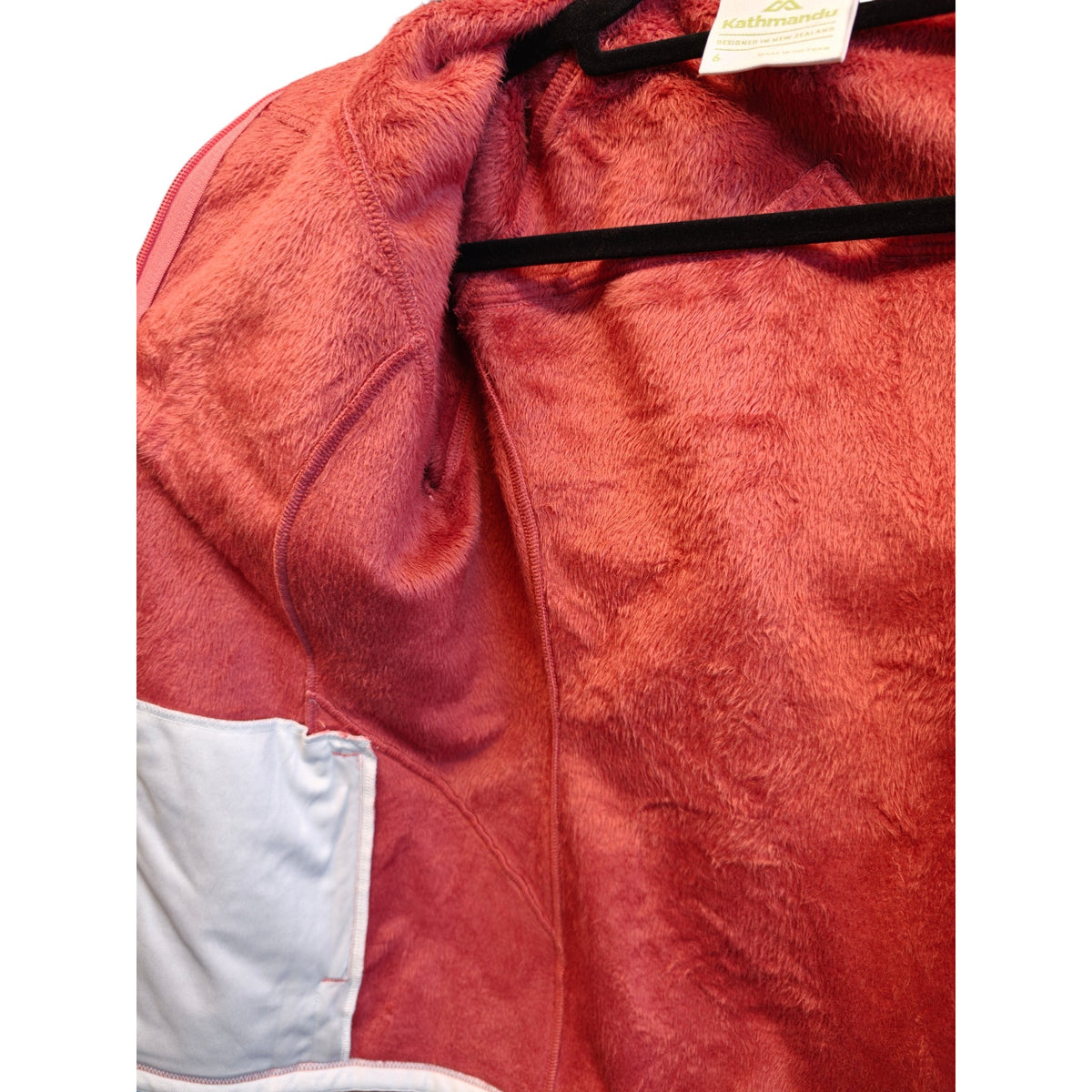 Close-up detail of Kathmandu Women's Hooded Fleece Jacket - Size 6