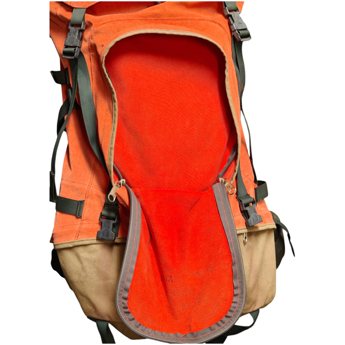 Orange Macpac Cascade backpack - open front pocket and fabric wear