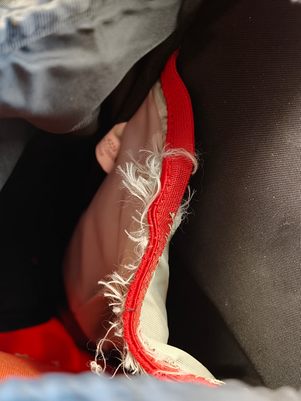 Orange Salewa Summit 36 backpack - frayed fabric detail
