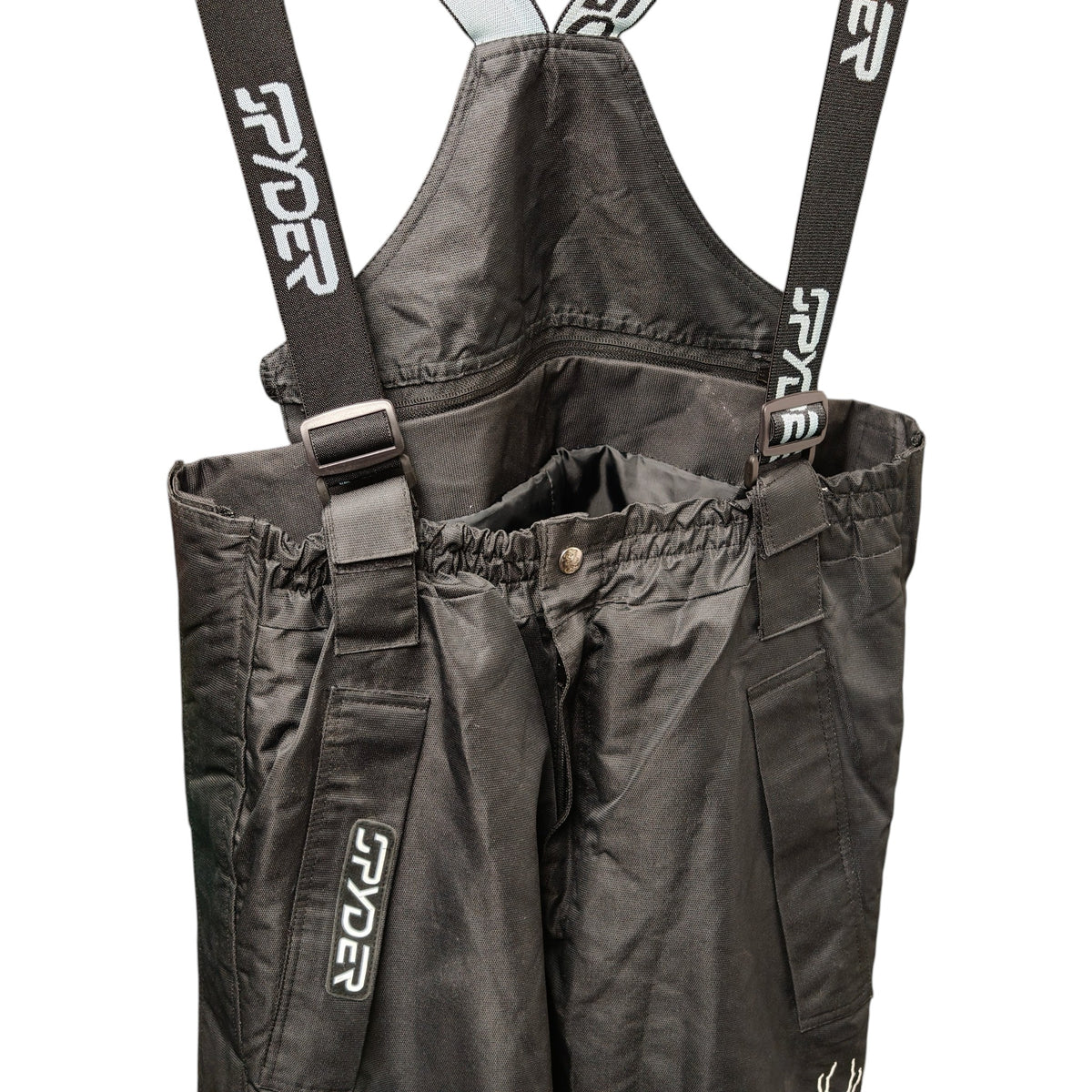 Close-up detail of Spyder Men's Large Ski Bib Pants - Black