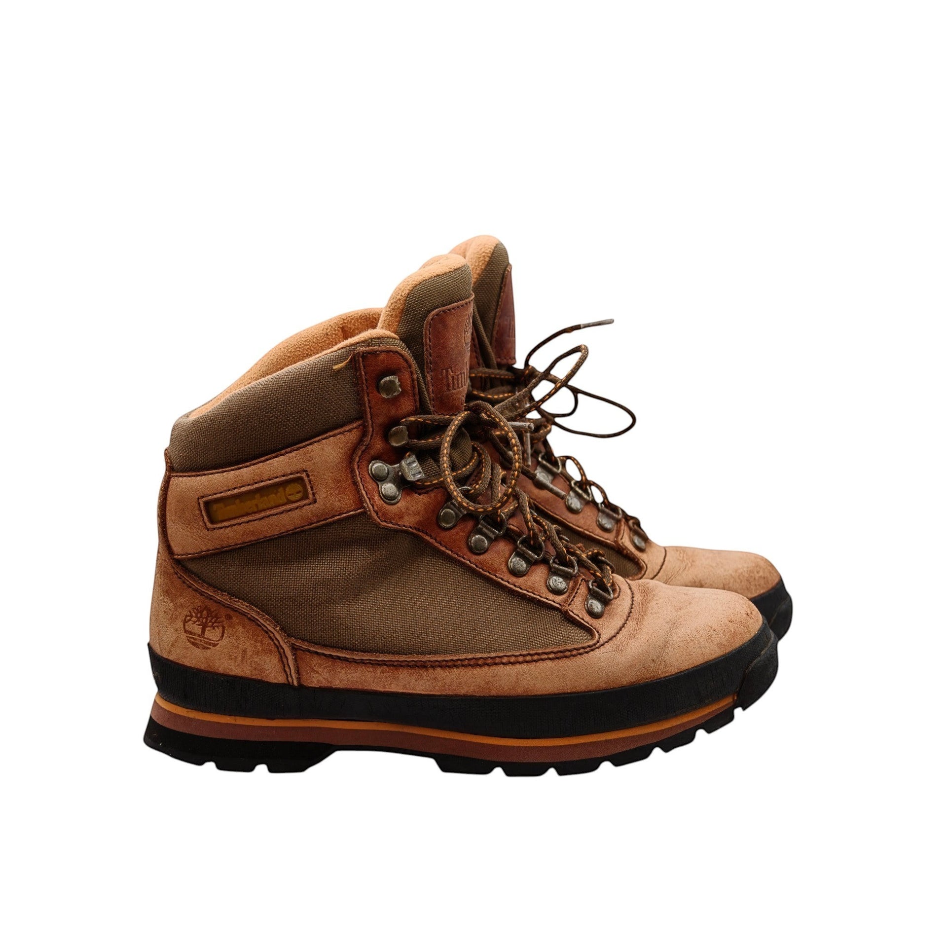 Timberland Gore-Tex hiking boots in tan leather and brown canvas with a durable sole. Features ankle support and waterproof lining.
